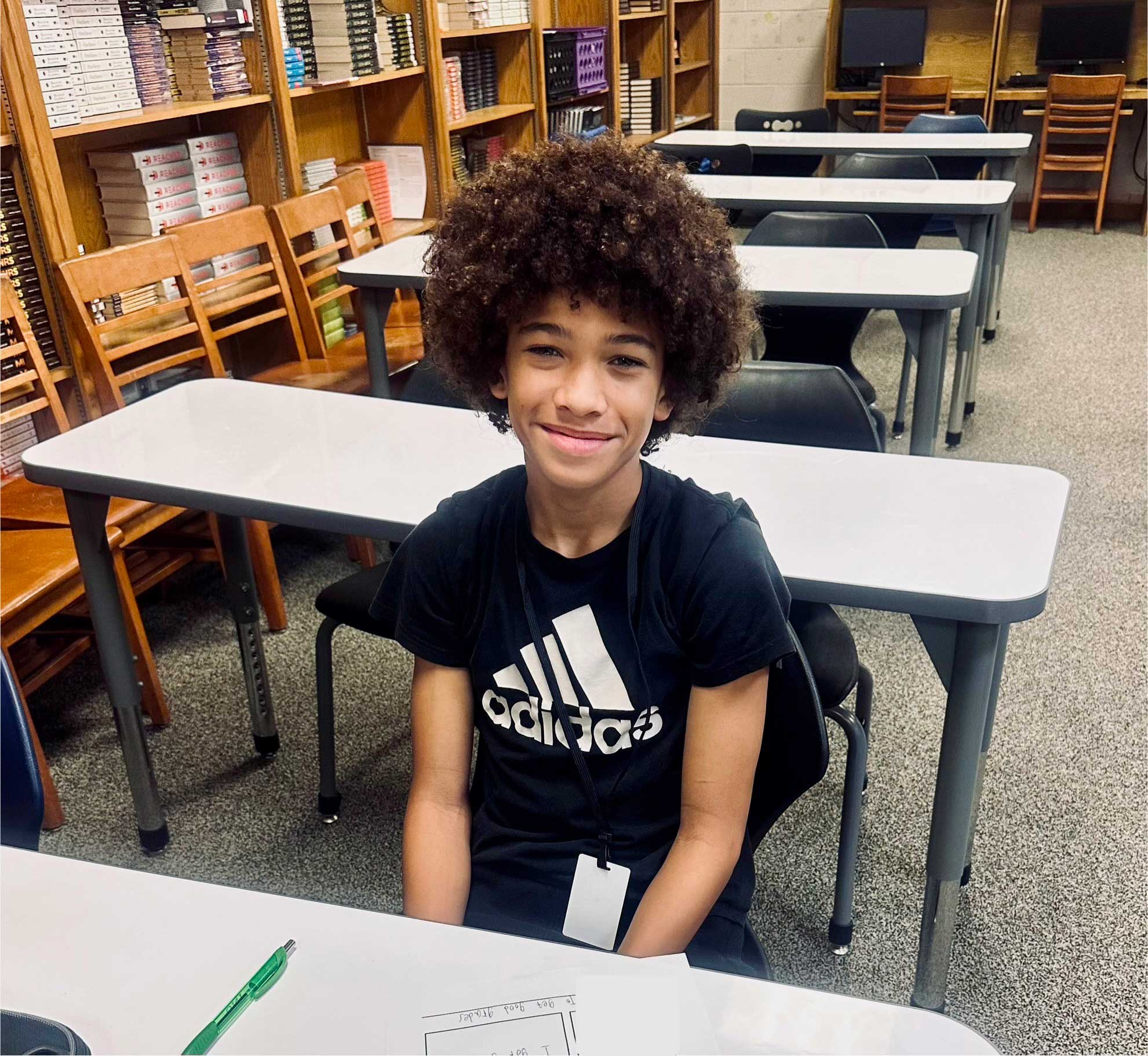 A student from GJHS smiles in the classroom